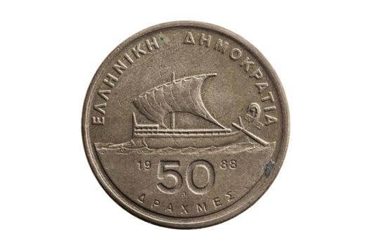 Greek 50 drachmas coin dated 1988 reverse ancient sailing boat cut out and isolated on a white background