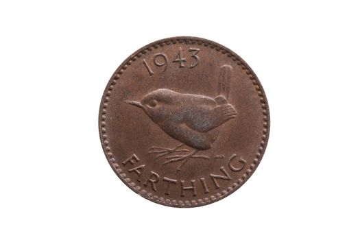 Old pre decimal 1943 George VI farthing coin of England UK reverse Wren cut out and isolated on a white background