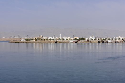View of a part of the city called  Ar Rashah with mountains in background, Sur, Sultanate of Oman