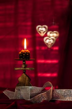 Christmas concept with red background and candles