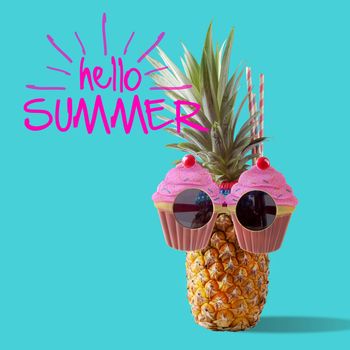 Summer and Holiday concept.Hipster Pineapple Fashion Accessories and Fruits on blue and hello summer word background