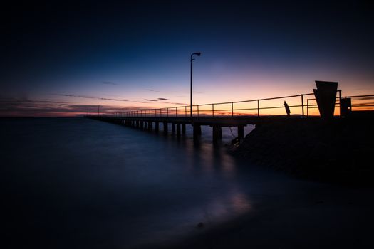 The iconic Rye Pier on a cool winter's morning at sunrise on the Mornington Peninsula in Melbourne, Victoria, Australia