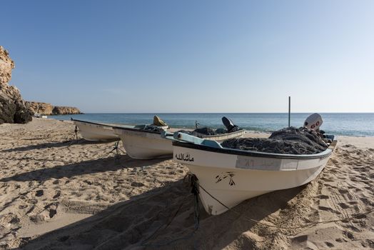 Fishermen boats on a beach of Ras Al Jinz, Sultanate of Oman