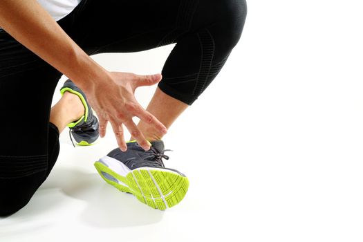 Runner sportsman holding ankle in pain with Broken twisted joint running sport injury and Athletic man touching foot due to sprain on white background