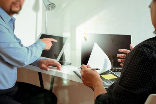 co working team meeting concept,businessman using smart phone and digital tablet and laptop computer in modern office