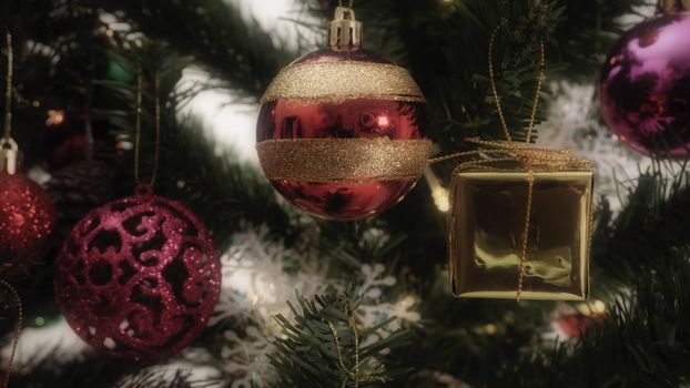 Greeting Season concept.close up of ornaments on a Christmas tree with decorative light