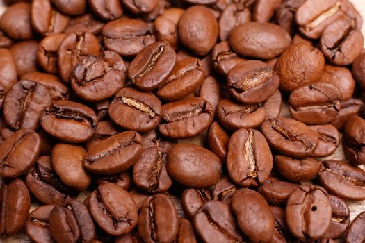 Brown coffee, background texture. Close-up. View from above