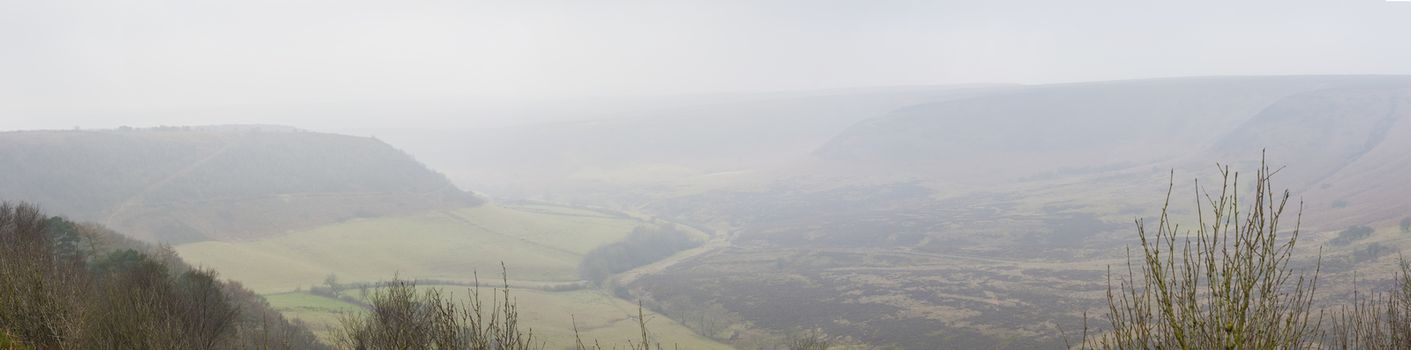 English rural countryside landscape scene over a misty valley