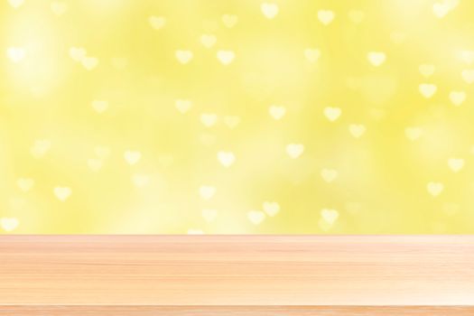 empty wood table floors on bokeh lights heart soft yellow background, wood table board empty front bokeh heart shape colorful, wooden plank blank on colorful bokeh shine heart shape soft yellow
