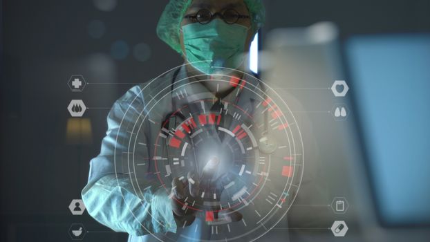 Medical technology concept,smart doctor hand working with modern computer in hospital office with virtual icon diagram
