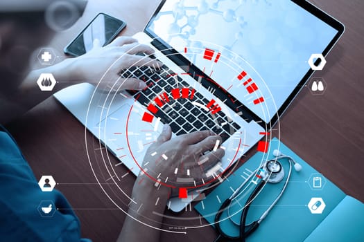 Medical techonlogy concept,smart doctor hand working with modern computer in hospital office with virtual icon diagram