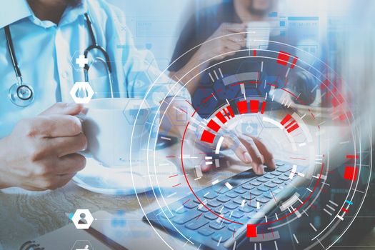 Medical doctor team taking coffee break.using digital tablet docking smart keyboard and smart phone on marble desk.listen music,twith VR icon diagram