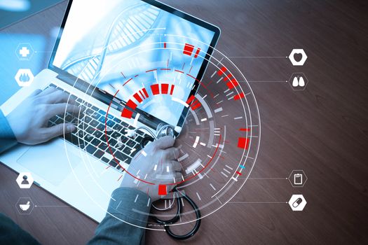 Medical techonlogy concept,smart doctor hand working with modern computer in hospital office with virtual icon diagram