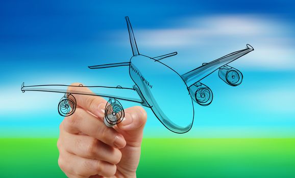 hand drawing airplane on blur blue sky background 