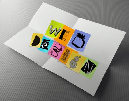 hand drawn web design on sticky note and crumpled paper