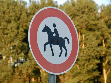 No riding sign with a horse and a rider