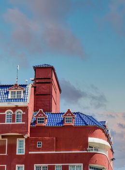 Red Plaster with Blue Tile Roof in Curacao