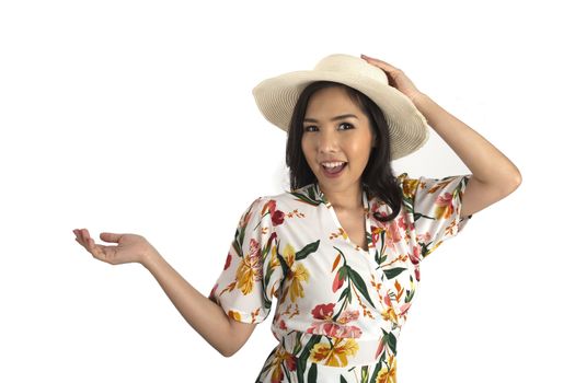 Half shot photo of pretty girl wearing floral dress put one hand on white straw hat in studio.