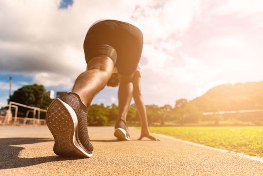 Asian young athlete sport runner black man active ready to start running training at the outdoor on the treadmill for a step forward, healthy exercise workout, closeup back on feet shoe