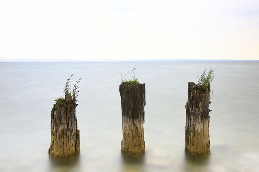 A long exposure view across Lake Garda in Italy viewed from the Sirmione waterfront.