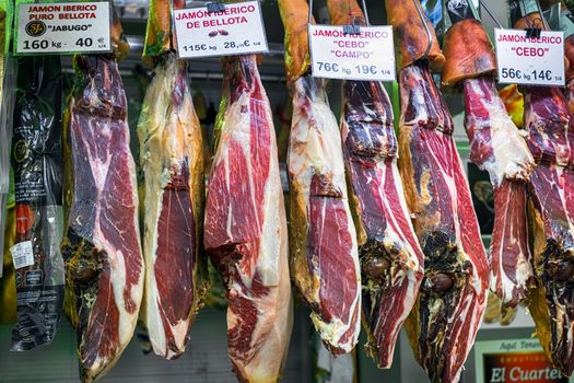Malaga, Spain - May 12, 2018. jamon iberico in the spanish Central Market Atarazanas (Mercado Central Atarazanas) located in Malaga city center, Spain.