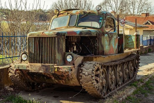 Krasen village, Bulgaria - April 01, 2017. Old crawler on the side of the road in the Krasen village, Bulgaria