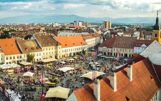 Sibiu, Romania - June 06, 2019, Street Food Festival Sibiu 2019 in Grand Square, Sibiu, Romania, aerial view