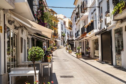 Marbella, Spain - June 27th, 2018. Typical old town street in Marbella, Costa del Sol, Andalusia, Spain, Europe