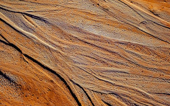 Abstract color sand texture to an abandoned mine of kaolin