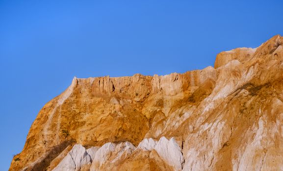 a fragment of a quarry of kaolin mining with beautiful blue sky