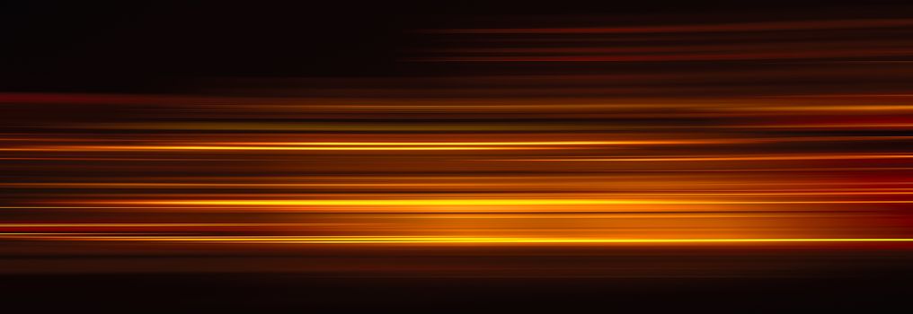 Abstract red light trails in the dark background