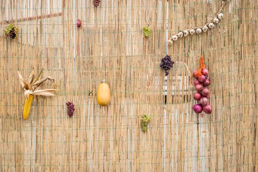 autumn products on a wicker wall