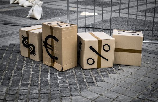 cartoon boxes with euro and dollar signs in Sibiu center, Romania