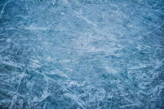 Blue ice in skate scratches, close view