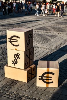 cartoon boxes with euro and dollar signs in Sibiu center, Romania