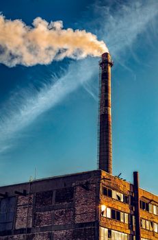 chimney smoking at a factory