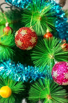 Christmas tree decorated with globles and tinsel