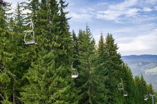 chairlift with pine trees behind, Ski resort, summer view