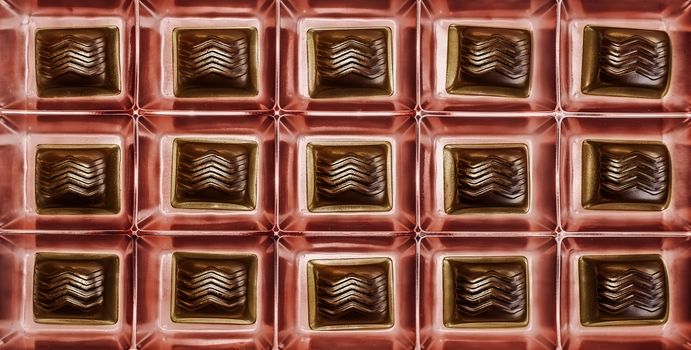 chocolates pralines in gold box