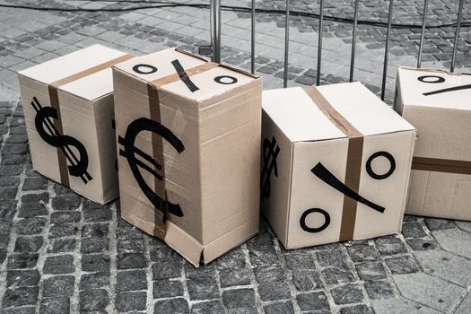 cartoon boxes with euro and dollar signs in Sibiu center, Romania