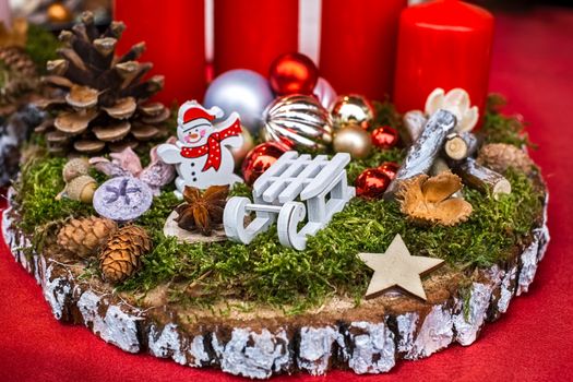 christmas decorations on a piece of wood