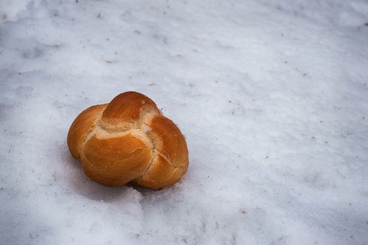 bread knit throwing on the snow, waste of food