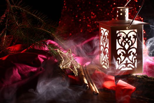 christmas backgrounds with low key lighting with candles and lantern