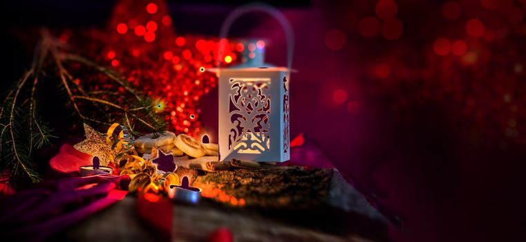 christmas backgrounds with low key lighting with candles and lantern