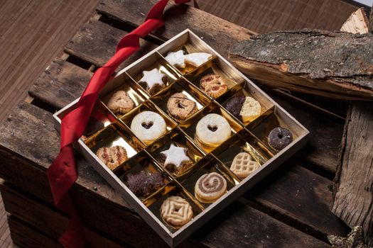 christmas backgrounds with low key lighting with candles and cookies