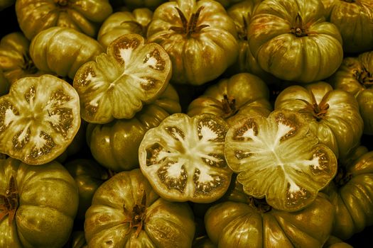 fresh yellow tomatoes at the market