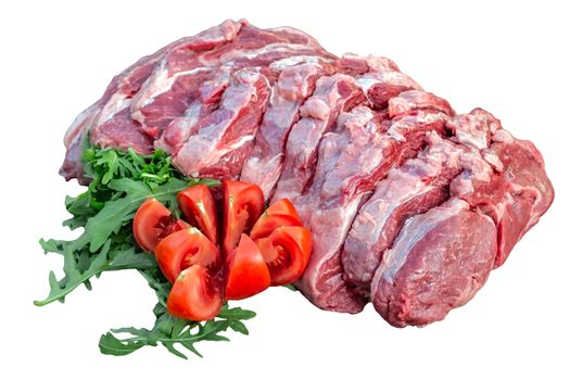 fresh raw pork meat with greens and sliced tomato isolated on white
