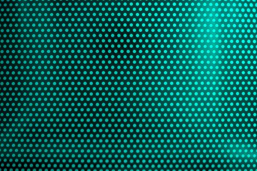 green light through perforated bent metal sheet