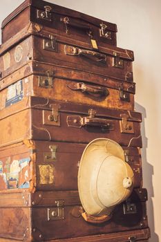 old suitcase with different size stacked