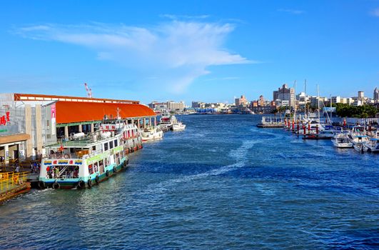 KAOHSIUNG, TAIWAN -- JULY 4, 2016: A view of the cross-harbor ferry pier with a ferry departing for Chijin Island.
